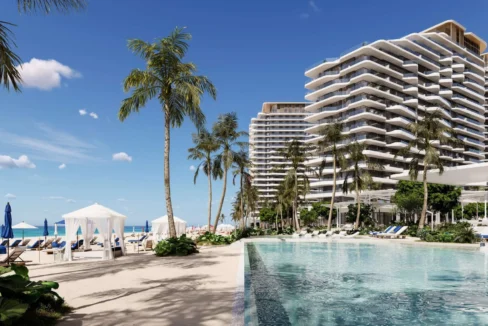 A sunny beach scene at Nikki Beach with palm trees, a swimming pool, and modern buildings.